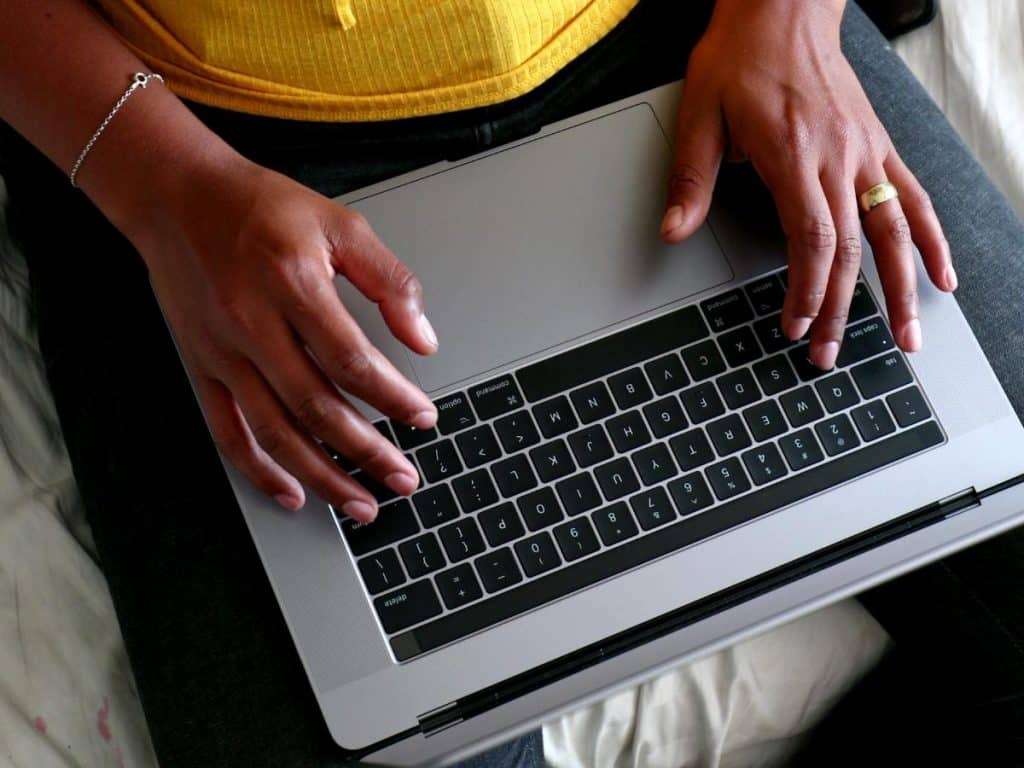 BIPOC woman accessing online therapy in Rhode Island